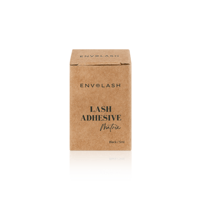 The image shows the packaging of Matrix Lash extension  Adhesive, made from recycled cardboard, highlighting its eco-friendly design